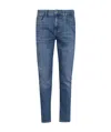 7 For All Mankind Faded Tapered Denim Jeans In Blue