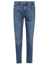 7 For All Mankind Luxe Performance Plus Slimmy Tapered Slim Fit Jeans In Mid Blue In Light Blue
