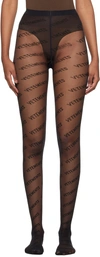 Vetements Semi-sheer Monogram-pattern Stockings In Black