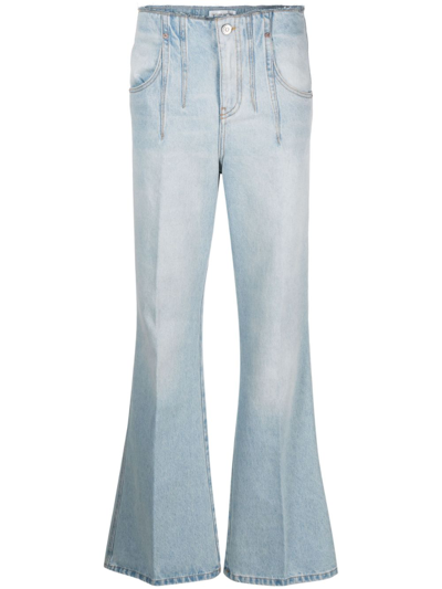 Victoria Beckham Distressed Flared Jeans In Light_mid_vintage_wash