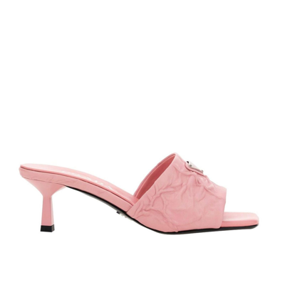 Prada Logo Quilted Mules In Pink