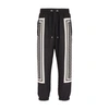 Balmain Monogram-scarf Drawstring Track Pants In Black