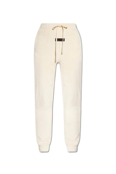 Essentials Fear Of God  Logo Patch Velour Sweatpants In Egg_shell