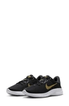 Nike Flex Experience Athletic Sneaker In Black/ Gold/ Smoke Grey