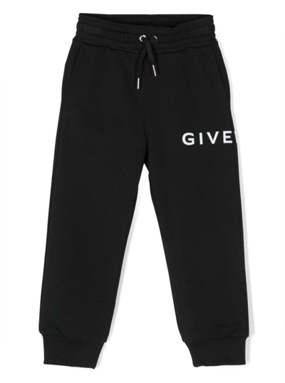 GIVENCHY BLACK TRACK PANTS WITHY CONTRASTING LOGO PRINT IN COTTON BOY