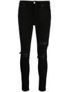 AMIRI MX1 LEATHER-TRIMMED DISTRESSED SKINNY JEANS