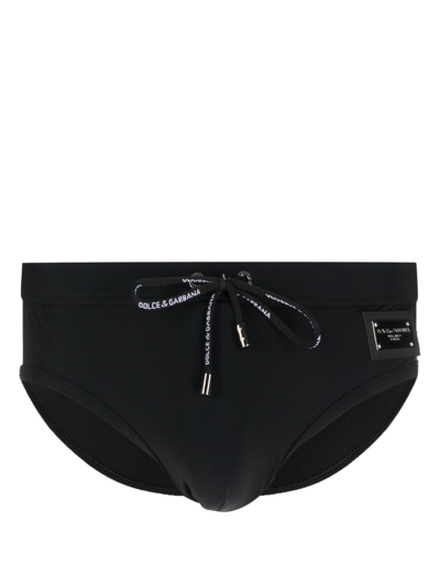 Dolce & Gabbana Bold Logo Plaque Swim Trunks For Men In Black