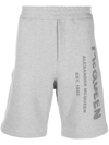 Alexander Mcqueen Alexander Mc Queen Bermuda Shorts With Graffiti Logo Print In Grey