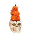 GERSON INTERNATIONAL 23" H ELECTRIC LIGHTED MAGNESIUM SMOKING SKULL WITH PUMPKINS ON TOP