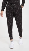 Terez Foil Printed Jogger In Black/silver Stars In Multi