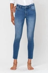 Flying Monkey Simon Mid Rise Raw Hem Skinny Jean In Medium Wash In Multi