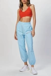 MSGM SLOGAN PRINT TRACK PANT IN LIGHT BLUE