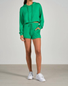 Elan Cheri Long Sleeve Hoodie Crop Top In Green In Green
