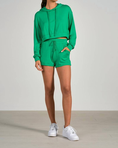 Elan Cheri Long Sleeve Hoodie Crop Top In Green