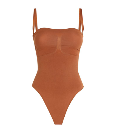 Skims Seamless Sculpt Thong Bodysuit In Orange