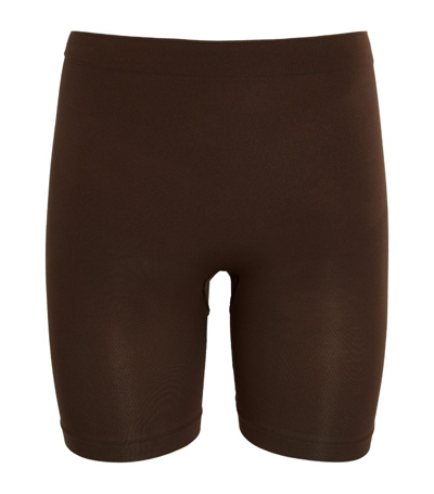 Skims Seamless Sculpt Mid-thigh Shorts In Brown