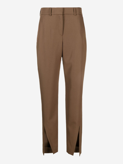 Balmain Slit-detail Wool Tapered Trousers In Brown