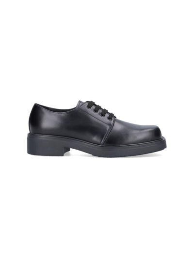 Prada Brushed Leather Derby In Black
