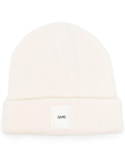 Oamc Logo-patch Ribbed-knit Beanie In Natural White