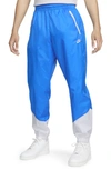 Nike Men's Windrunner Woven Lined Pants In Blue