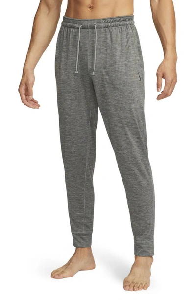 Nike Men's  Yoga Dri-fit Jogger Trousers In Grey