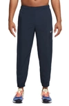 Nike Dri-fit Tapered Versatile Pants In Obsidian/ Black/ Silver