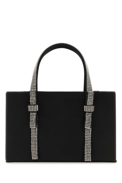 Kara Handbags. In Black