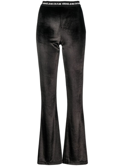 Versace Jeans Couture Logo Waistband Flared Trousers In Black