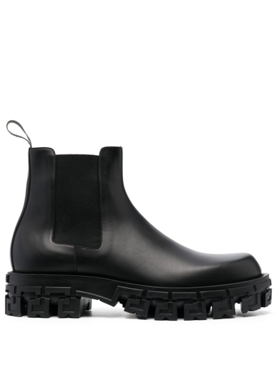 Versace Greca-sole Ankle Boots In Nero