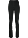 Alexander Wang Logo-embossed Legging Trousers In Black