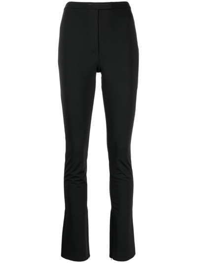 Alexander Wang Logo-embossed Legging Trousers In Black