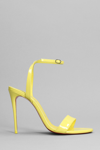 CHRISTIAN LOUBOUTIN LOUBIGIRL 100 SANDALS IN YELLOW PATENT LEATHER