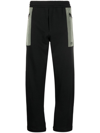 Alexander Mcqueen Contrast-pocket Cotton Track Pants In Schwarz
