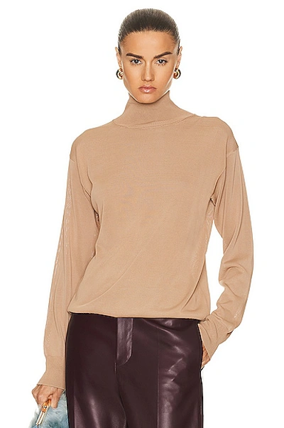 Khaite Paco Knitted Turtleneck Top In Almond