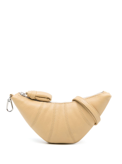 Lemaire Croissant Leather Coin Purse Necklace In Neutrals