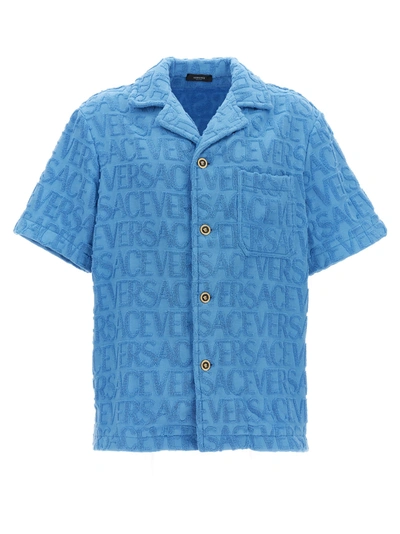 Versace Allover Logo-embossed Cotton Towel Shirt In Light Blue