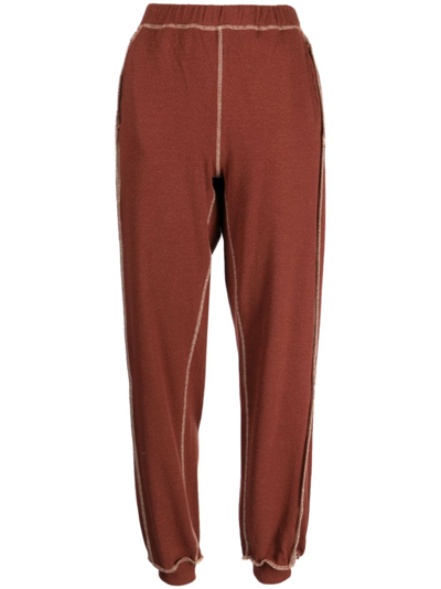 Baserange Exposed-seam Fine-ribbed Track Pants In Red