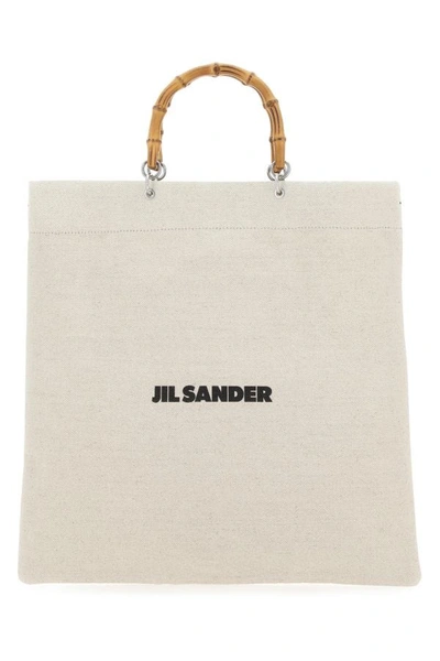 JIL SANDER JIL SANDER MAN SAND CANVAS HANDBAG