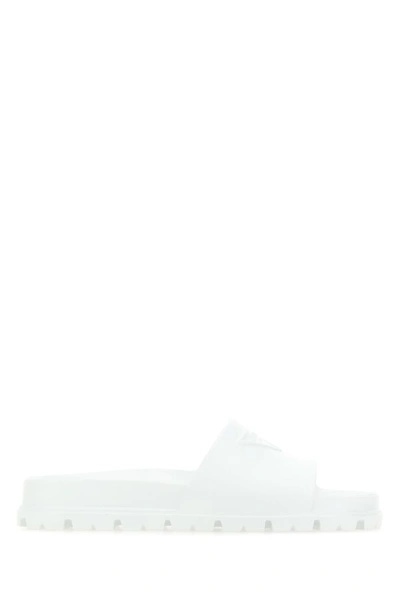 Prada Logo Embossed Open Toe Slippers In White
