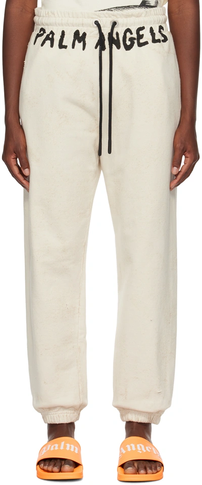 Palm Angels Off-white Faded Sweatpants In White Black