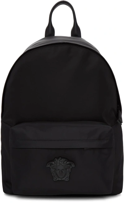 Versace Logo-appliquéd Leather-trimmed Shell Backpack In Black