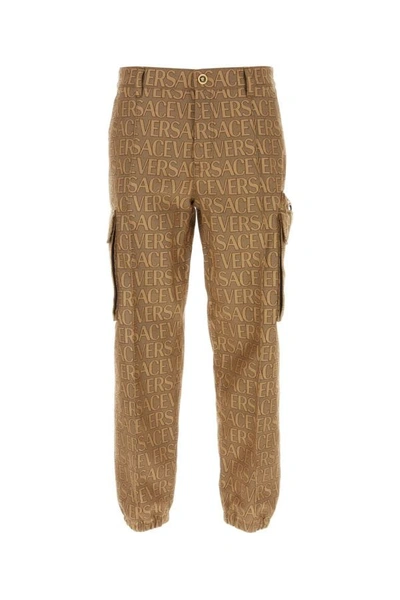 VERSACE VERSACE MAN EMBROIDERED JACQUARD VERSACE ALLOVER CARGO PANT