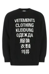 Vetements Intarsia-knit Logo Jumper In Black