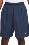 Nike Solo Swoosh Water Repellent Stretch Nylon Shorts In Blue