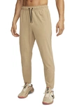 Nike Men's Unlimited Dri-fit Zippered Cuff Versatile Pants In Brown