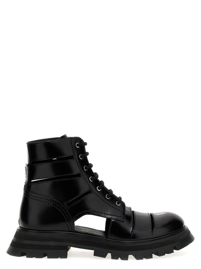 Alexander Mcqueen The Wander Cutout Leather Boots In Black