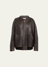 The Row Kengia Distressed Leather Bomber Jacket In Brown