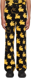 JW ANDERSON BLACK & YELLOW 'ALL OVER BUNNY' TROUSERS