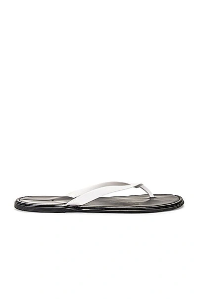 The Row Round Head Flat-bottom Flip Flops In Black