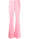 Versace La Greca Patterned Silk Blend Trousers In Pink